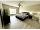Large Primary bedroom with a king-size bed and plenty of closet space at 8417 Secret Key Cove, Kissimmee, FL 34747