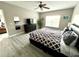 Comfortable Primary bedroom with a king-size bed and en-suite bathroom at 8417 Secret Key Cove, Kissimmee, FL 34747
