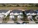 An aerial view of townhomes overlooking the community golf course at 853 Ocean Course Ave # 853, Davenport, FL 33896