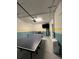 Game room features a ping pong table, television and small table with seating at 853 Ocean Course Ave # 853, Davenport, FL 33896