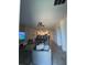 Open-concept living space with a comfortable couch, modern decor, and an adjacent kitchen and dining area at 853 Ocean Course Ave # 853, Davenport, FL 33896