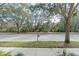 Residential street with mature trees and landscaping at 854 Spring Park Loop, Celebration, FL 34747