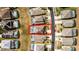 Aerial view highlighting a house with a pool in a neighborhood at 8614 La Isla Dr, Kissimmee, FL 34747
