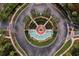 Community entrance with circular driveway and fountain at 8614 La Isla Dr, Kissimmee, FL 34747
