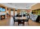 Community room with tables, chairs, fireplace, and TV at 8614 La Isla Dr, Kissimmee, FL 34747