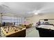 Fun game room, including foosball, air hockey, and pool table at 8614 La Isla Dr, Kissimmee, FL 34747