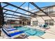 Relaxing pool and spa with covered patio at 8614 La Isla Dr, Kissimmee, FL 34747