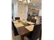 Dining room features a large table with seating for six at 8968 California Palm Rd, Kissimmee, FL 34747