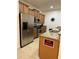 Modern kitchen with stainless steel appliances and granite countertops at 8968 California Palm Rd, Kissimmee, FL 34747