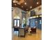 Community clubhouse lobby with comfortable seating and cinema at 8968 California Palm Rd, Kissimmee, FL 34747