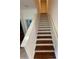 Clean, carpeted stairs leading to the upper level at 8968 California Palm Rd, Kissimmee, FL 34747