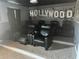 Home theater with reclining seats and Hollywood backdrop at 9158 Scramble Dr, Davenport, FL 33896