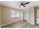 Comfortable bedroom with a window view and closet, creating a cozy and functional space at 927 Mare Bello Dr, Winter Park, FL 32792