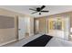 Comfortable bedroom with sliding door access to the patio, seamlessly blending indoor and outdoor living at 927 Mare Bello Dr, Winter Park, FL 32792