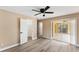Bedroom featuring a walk-in closet and sliding glass doors with outdoor access at 927 Mare Bello Dr, Winter Park, FL 32792