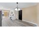 Bright, renovated kitchen featuring white cabinetry, stainless steel appliances, and modern finishes at 927 Mare Bello Dr, Winter Park, FL 32792