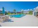 Inviting community pool with patio seating at 1014 Plantation Dr # A9, Kissimmee, FL 34741
