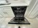 Whirlpool dishwasher with stainless steel interior and integrated controls at 1014 Plantation Dr # A9, Kissimmee, FL 34741