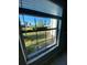 View of community landscape from window at 1014 Plantation Dr # A9, Kissimmee, FL 34741