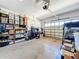 Well-organized garage featuring epoxy floors, shelving, and plenty of storage space at 127 Terra Vista Ln, Kissimmee, FL 34759