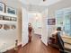 The home office features a wood floor, double doors, and is filled with natural light, offering a versatile workspace at 127 Terra Vista Ln, Kissimmee, FL 34759