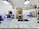 Modern kitchen featuring granite counters, a large island, and white cabinets at 127 Terra Vista Ln, Kissimmee, FL 34759