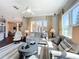 Bright living room with large windows and comfortable seating at 127 Terra Vista Ln, Kissimmee, FL 34759