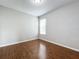 Bedroom boasts natural lighting and hardwood floors at 1404 Lexington Avenue, Davenport, FL 33837
