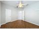 This bedroom features hardwood floors and neutral-colored walls at 1404 Lexington Avenue, Davenport, FL 33837