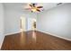 Bedroom with hardwood floors and access to bathroom at 1404 Lexington Avenue, Davenport, FL 33837