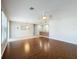 Bright living area with hardwood floors, neutral walls, and great lighting at 1404 Lexington Avenue, Davenport, FL 33837