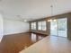 Bright living area with hardwood floors and pool view at 1404 Lexington Avenue, Davenport, FL 33837