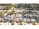Aerial view of a residential neighborhood with neatly arranged homes and lush greenery at 143 Hollingshead Loop, Davenport, FL 33896