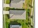 Overhead shot of the roof, lush lawn, and landscaping in this quiet community at 1813 Castleton Dr, St Cloud, FL 34771