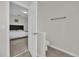 Simple half bathroom with toilet and small vanity at 1813 Castleton Dr, St Cloud, FL 34771