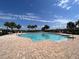 Inviting community pool with lounge chairs at 1813 Castleton Dr, St Cloud, FL 34771