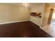 Spacious living room with dark laminate wood flooring at 2024 Trinidad Ct, Kissimmee, FL 34741