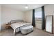 Bedroom featuring neutral carpeting, large window, and stylish furnishings at 2352 Tay Wes Dr, St Cloud, FL 34771