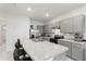 Bright kitchen boasting stainless steel appliances, and a large island with barstool seating at 2352 Tay Wes Dr, St Cloud, FL 34771