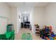 Spacious playroom with toys, a desk, and a basketball hoop for active fun at 2352 Tay Wes Dr, St Cloud, FL 34771