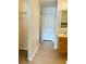 Bathroom with wood cabinets, tile floor, and a tub at 2403 Melissa Ann Ct, Kissimmee, FL 34746