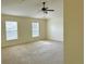 Large bedroom featuring neutral walls and carpet at 2403 Melissa Ann Ct, Kissimmee, FL 34746