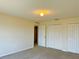 Spacious bedroom with ample closet space and neutral walls at 2403 Melissa Ann Ct, Kissimmee, FL 34746
