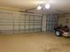 Attached garage with space for two vehicles and storage at 2403 Melissa Ann Ct, Kissimmee, FL 34746
