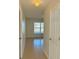 Hallway with tile floors and access to other rooms at 2403 Melissa Ann Ct, Kissimmee, FL 34746