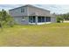 Two-story house with screened patio and large backyard at 2403 Melissa Ann Ct, Kissimmee, FL 34746