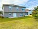 Two story house with a large backyard and patio at 2403 Melissa Ann Ct, Kissimmee, FL 34746