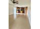 Open living room with a view into the kitchen area at 2403 Melissa Ann Ct, Kissimmee, FL 34746