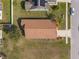 Overhead view showcasing the home's roofline and landscaping at 2542 Bobby Lee Ln, St Cloud, FL 34772