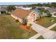House exterior with landscaped yard and driveway at 2542 Bobby Lee Ln, St Cloud, FL 34772